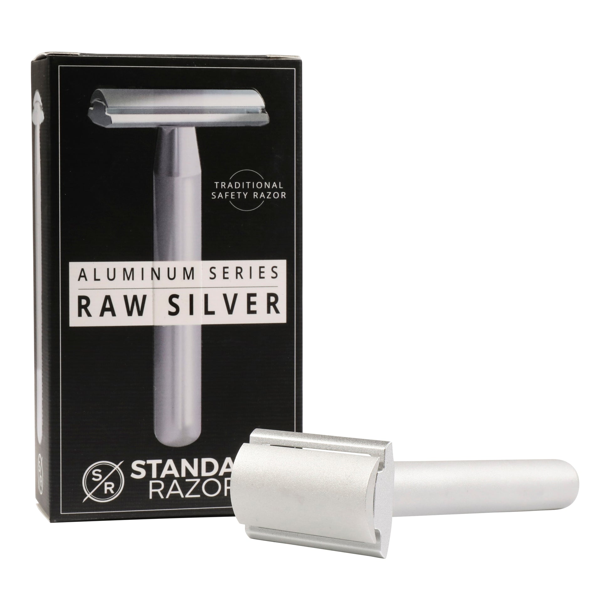 The Standard Razors - Aluminum Series - Double Edge Safety Razor (Raw Silver) is shown before its black box. This sleek aluminum razor by Standard Razors offers a precise, smooth shave suitable for everyone.